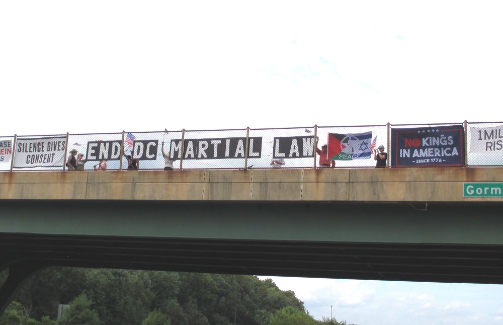 Large letter message on Gorman Rd/I-95 overpass “End DC Martial Law”
