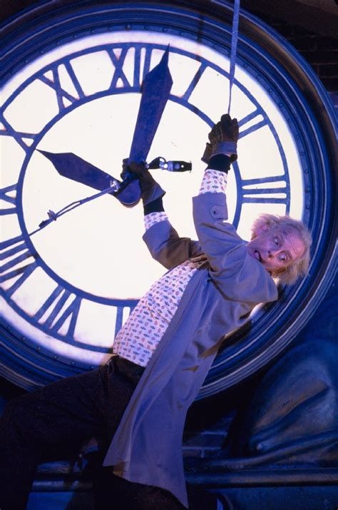 Doc Brown from Back to the Future, hanging from the Hill Valley town clock