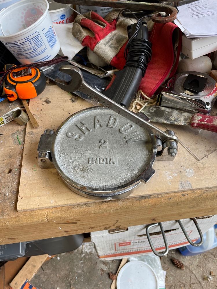 Tortilla press sporting a 9/16 handle.