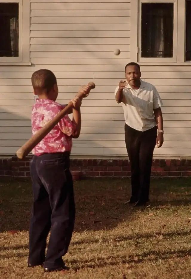 photo of mlk jr pitching to mlk iii.