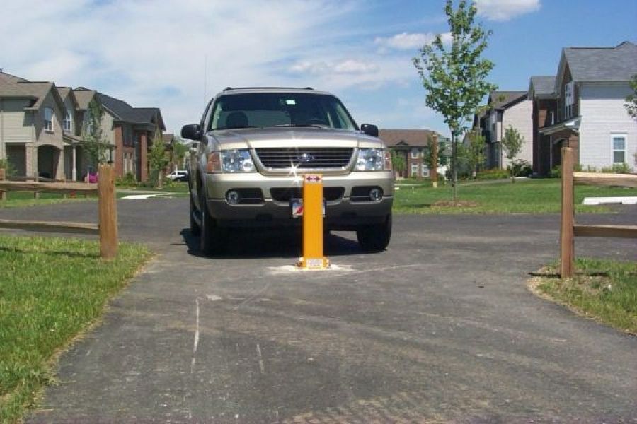 Example of bollard to block vehicle from bike/ped path