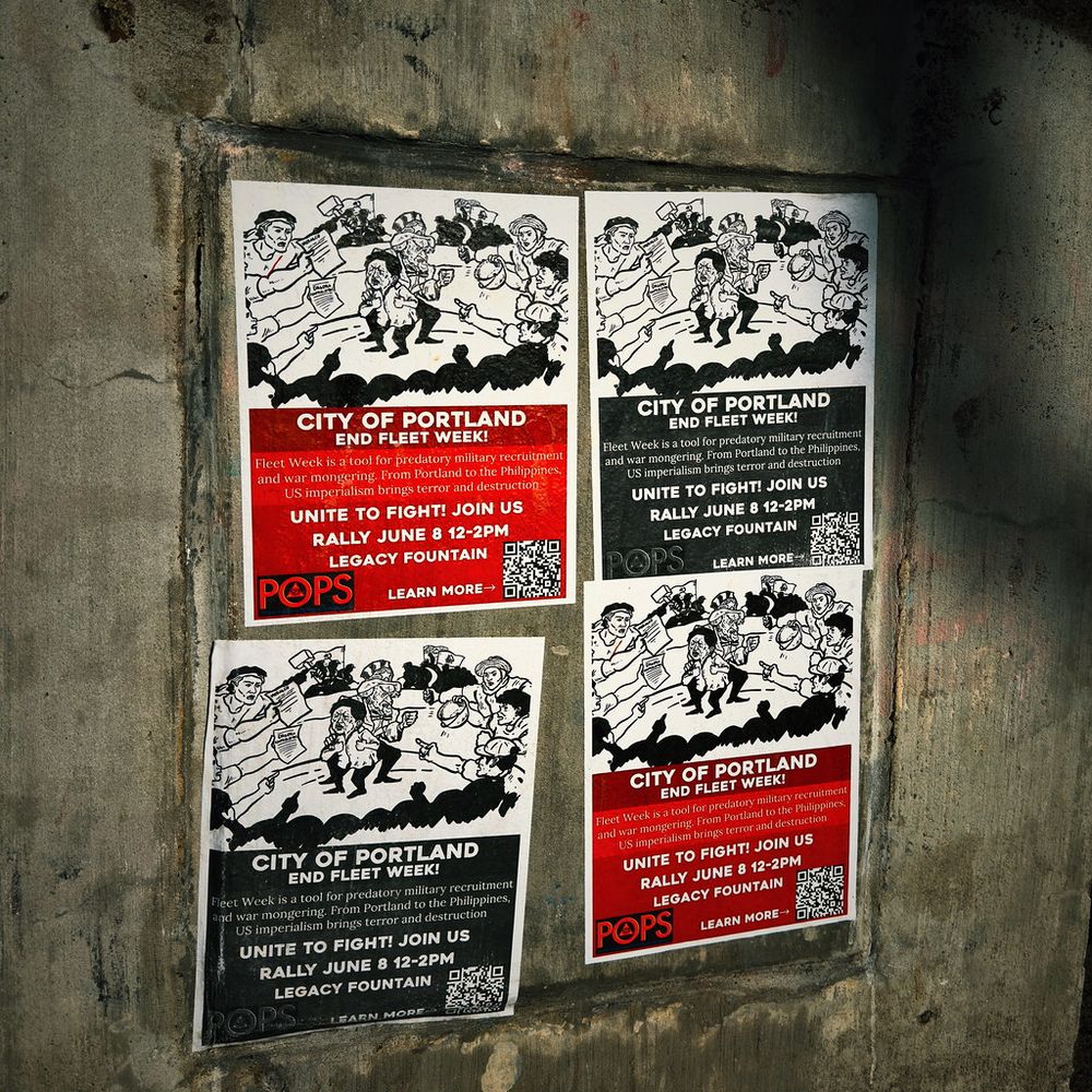 Wheatpastes on the Portland waterfront urging people to protest Fleet Week