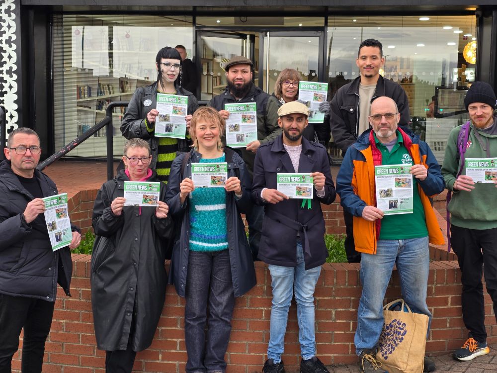 Mothin with a team of campaigners holding up leaflets, including Khizer Qayyum the next green candidate for Gipton and Harehills 