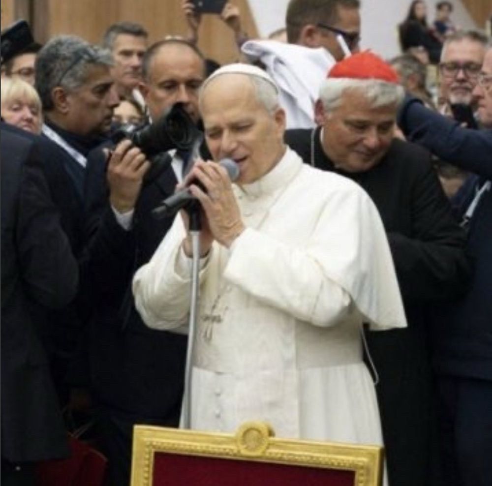 Pope with microphone, again