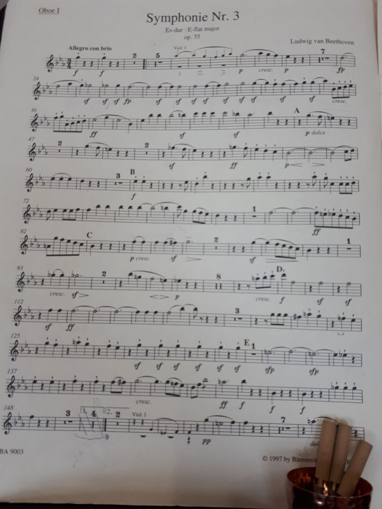 Sheet music - first oboe part for Beethoven's 3rd Symphony, also known as "Eroica".

The bottom right is obscured by a few reeds, soaking in readiness.  Not gin, unfortunately, although the copper-looking thing they're in ia s spirits measure which arrived attached to a bottle of Bloom's gin a few years ago.  This is the problem wiht the rise of digital photography - a dearth of old 35mm film canisters to use for this sort of thing.