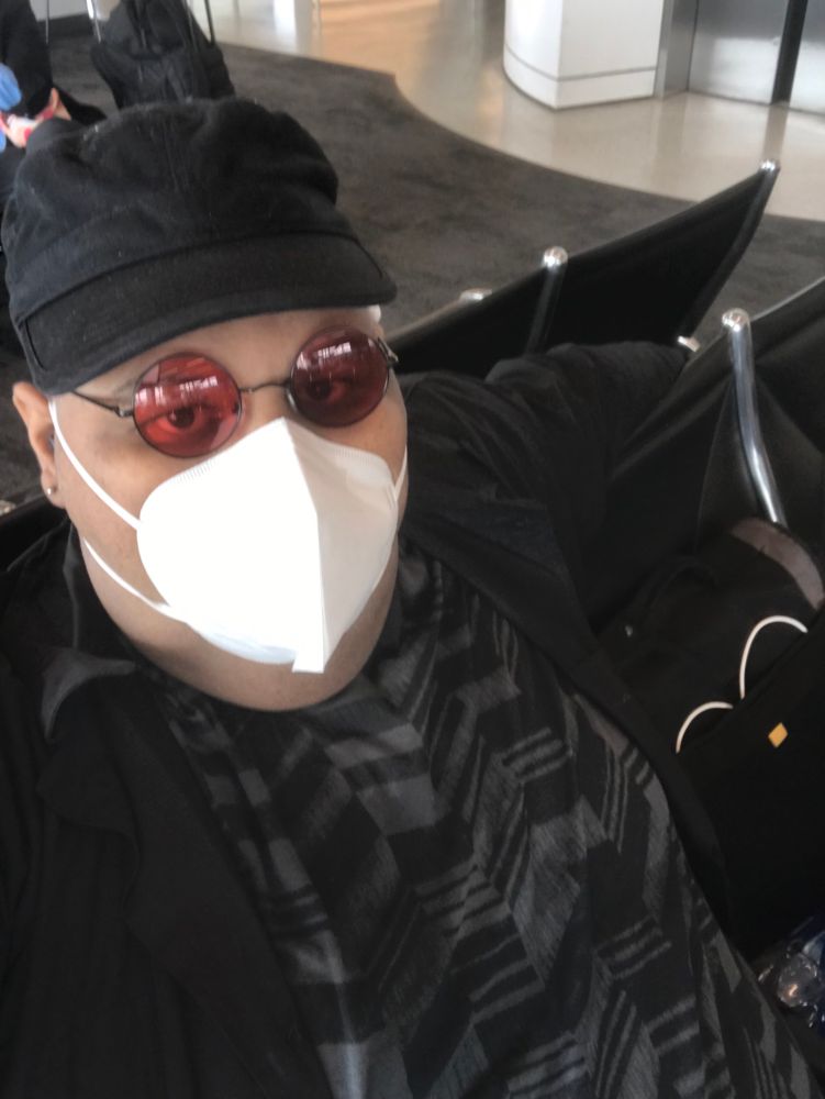 A selfie of me wearing an all black outfit and a kn95 mask 