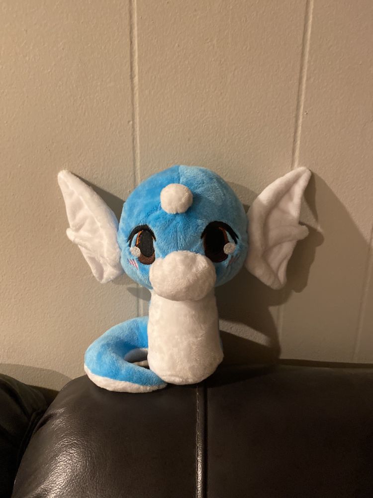 A small dratini plushie