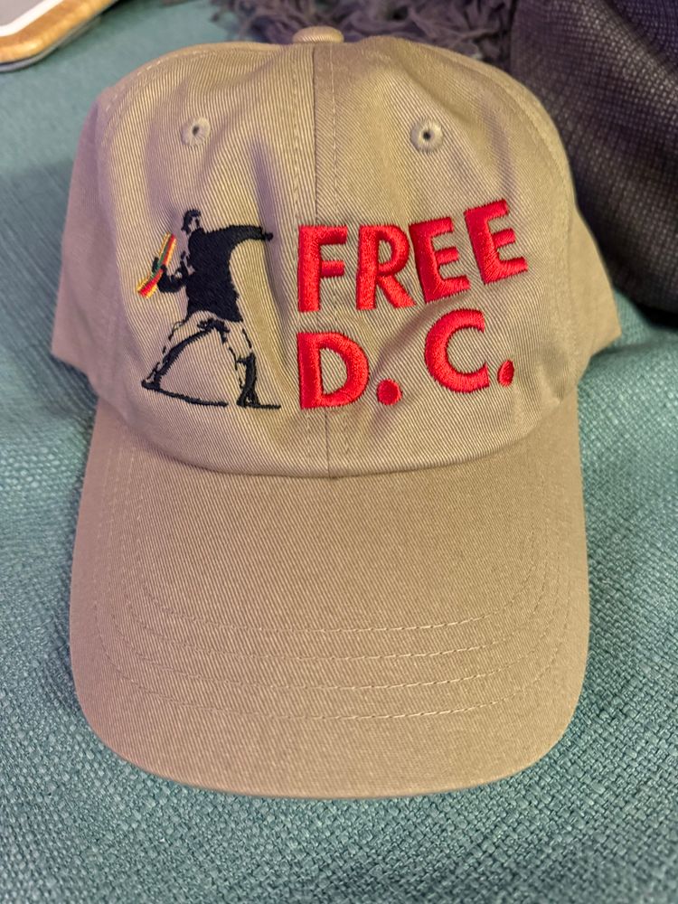 Free DC hat with man throwing sandwich 