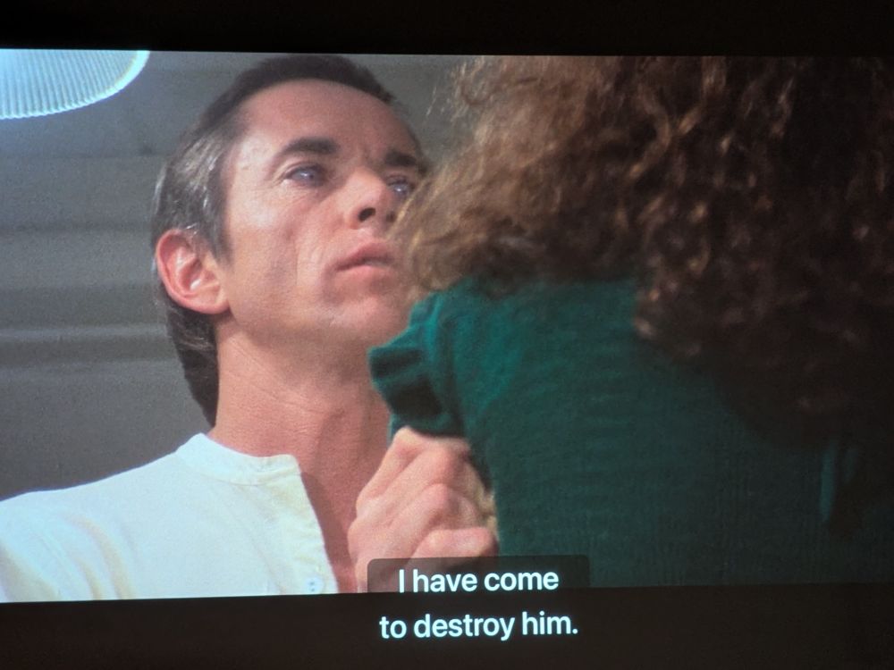 Scott Glenn as Glaeken menacingly grabbing the shoulders of Alberta Watson’s character Eva, saying “I have come to destroy him.” From Michael Mann’s The Keep (1983).