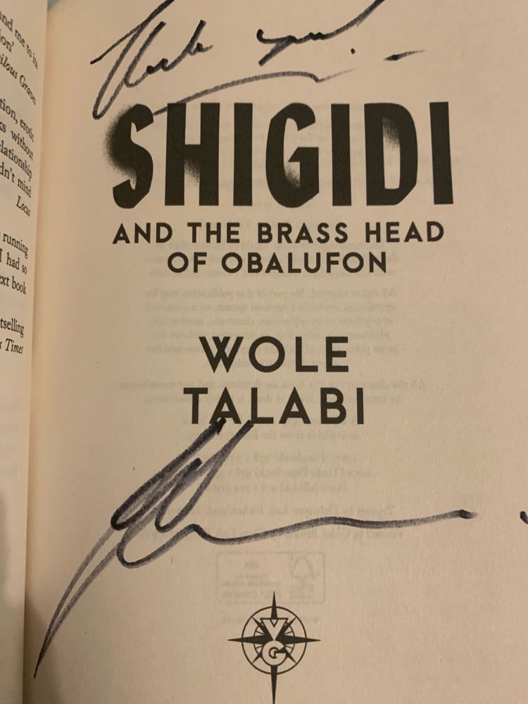 The inside title page of “Shigidi and the Brass Head of Obalufon” by Wole Talabi. Signed by Wole Talabi!