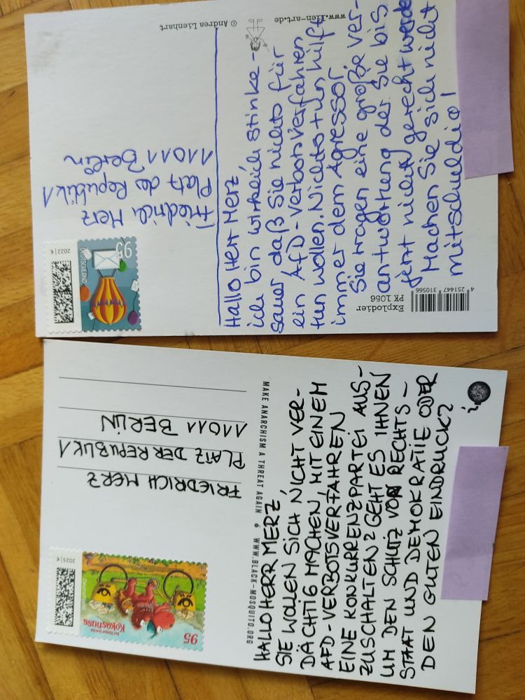 Zwei geschriebene Postkarten an Friedrich Merz