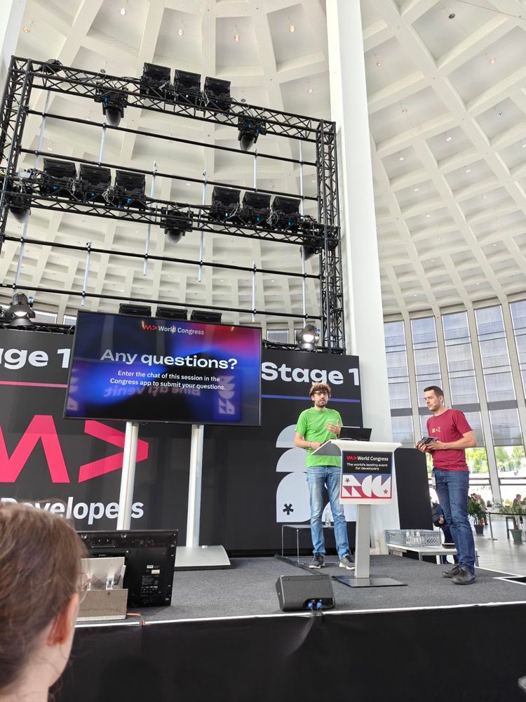 Jonathan on stage answering questions from the aduience