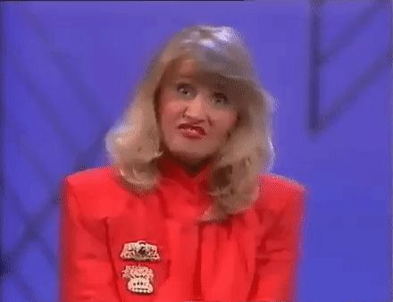 Woman from Copy Cats pulling an "I made a funny" face