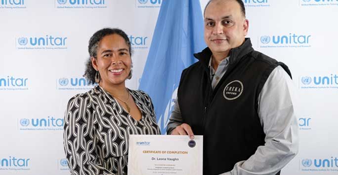 Leona receiving her UNITAR certificate