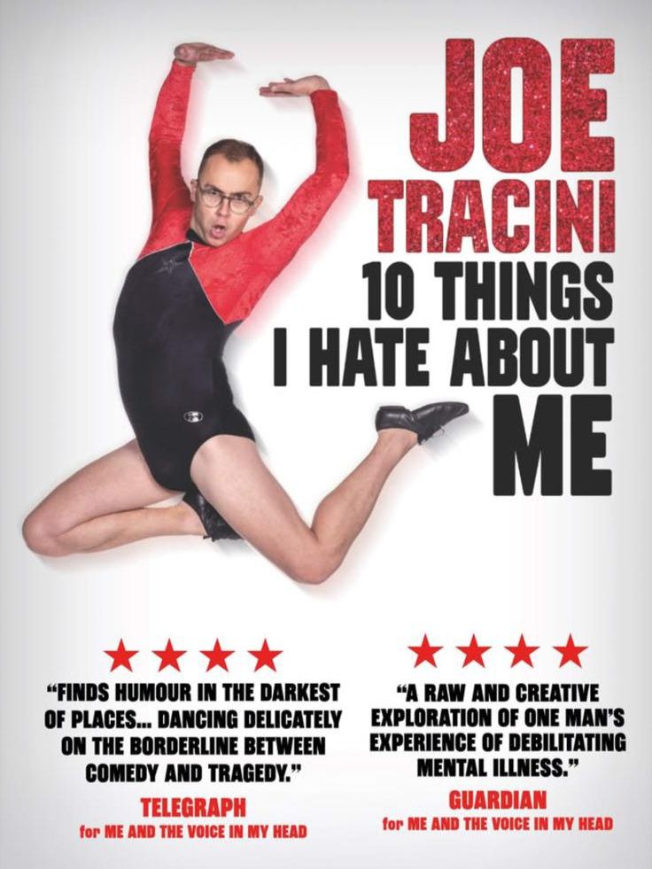 Joe, a man with dark hair and glasses, wearing a red & black leotard and dance shoes leaping in the air. A sparkly logo Joe Tracini: Ten Things I Hate About Me