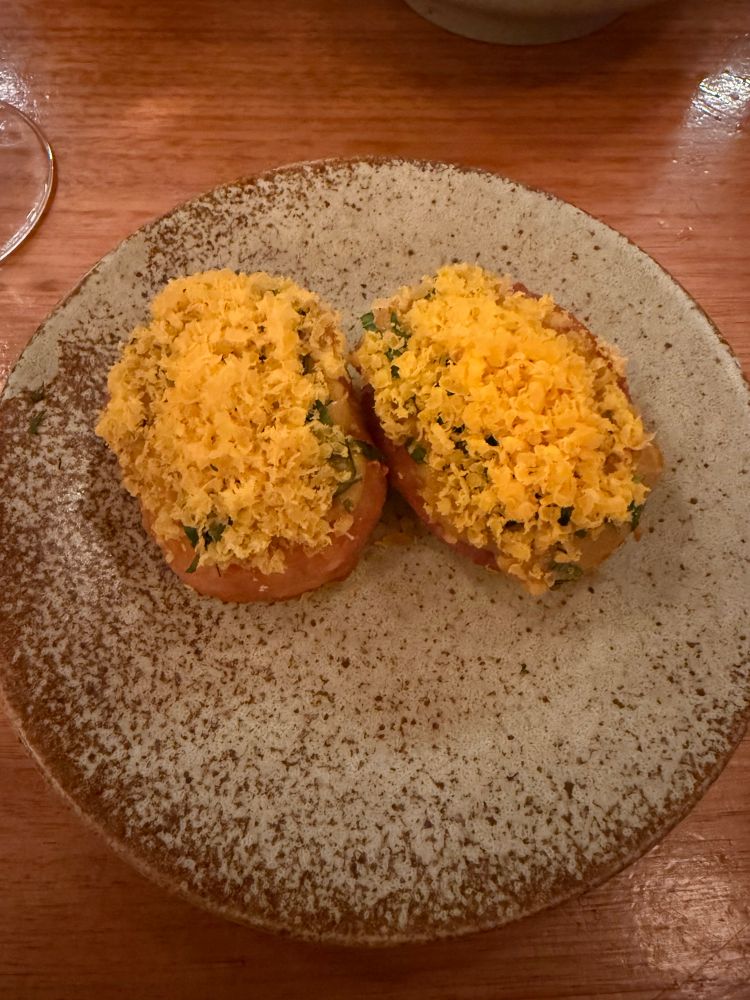 Image of fancy Kare Kare hash browns on a plate. 