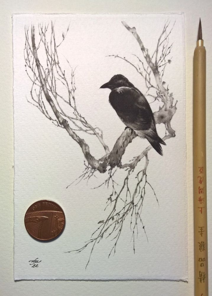 Painting in gradated black ink washes of a crow on a bare wintry branch, photographed with a penny and the traditional Chinese brush used to paint the piece for scale. The penny could obscure about half of the crow. 