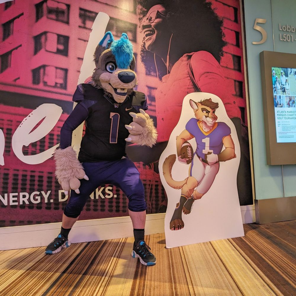Dewdrop posing in football gear and uniform next to the FWA 2024 football player mascot