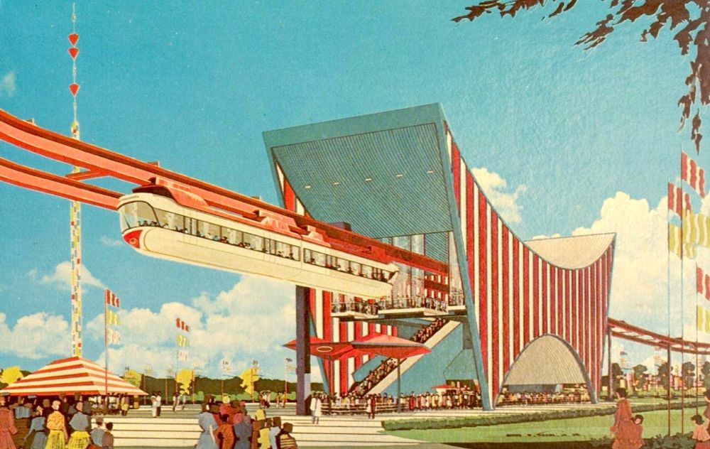 Folks ascended an escalator to the loading platforms within the angular striped terminal. Going around the loop took eight minutes, with the trains proceeding around 9 miles per hour. Enthusiastic attendants were on hand to point out notable features and attractions as folks enjoyed the beautiful views. Visitors flocked to ride the futuristic mode of transportation. 