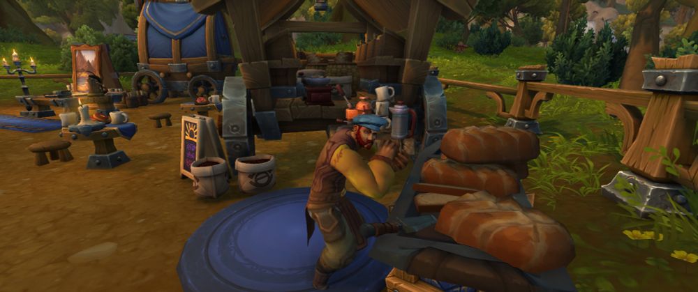 Screenshot from WoW Midnight Beta. A suspiciously odd looking salesman at the bread table in the Alliance player housing neighborhood. A coffee cart is shown behind him.