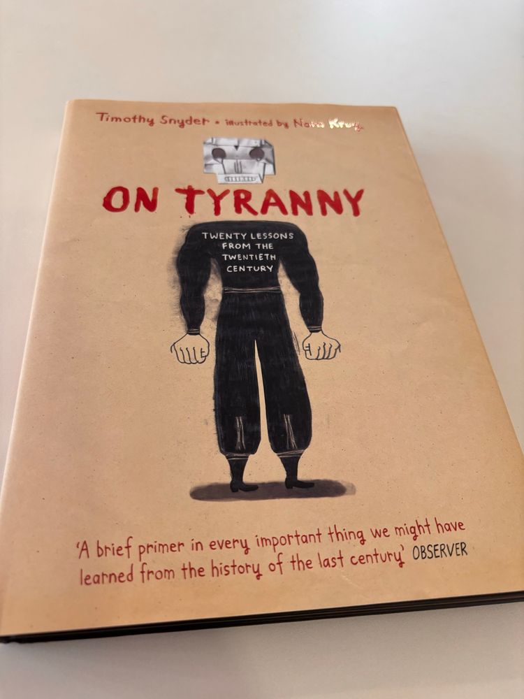 A copy of the book Tyranny by Timothy D. Snyder, illustrated by Nora Krug.