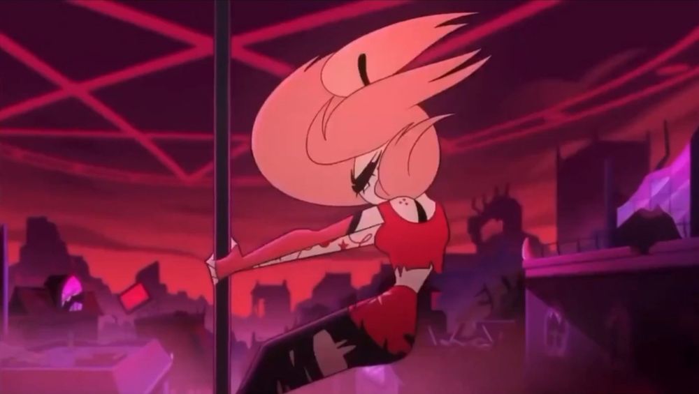 Cherry Bomb from Hazbin Hotel hanging on to a rooftop pole with both hands and feet, cyclops eye closed and pink hair billowing in the wind