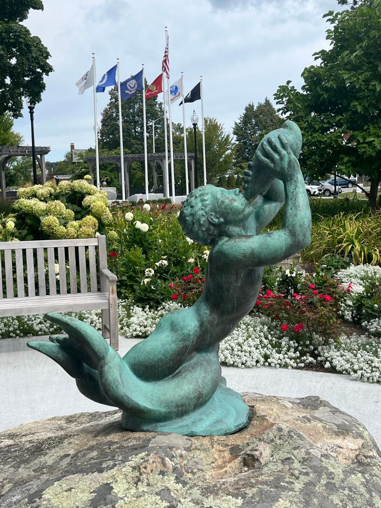 Merman calling out to you with his conch…