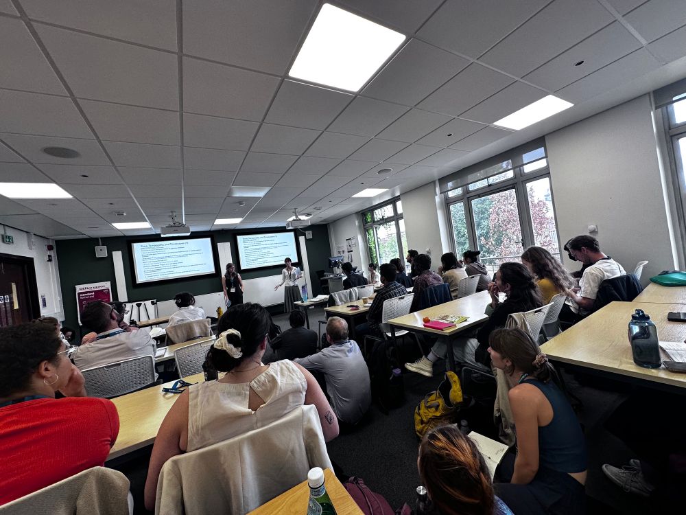 Lecture room filled with people at the University of Birmingham.