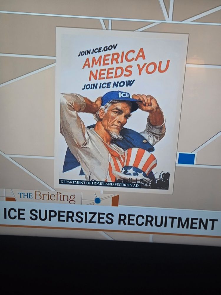 An old man (Uncle Sam) is all jacked and he’s putting on an ICE hat. His usual Uncle Sam hat is on front of him so that it appears that it’s the top of some dude’s head. 

The sign reads: America needs you! Join ICE now!

The bottom crawler from the nes channel reads, “ICE supersizes recruitment” 