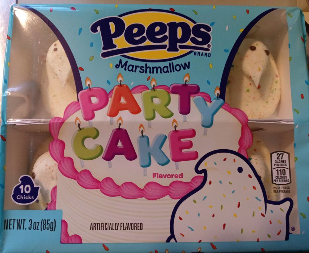 Package of ten Peeps Party Cake marshmallow chicks.  The chicks are a pale yellow/cream color with multicolored sugar sprinkles.