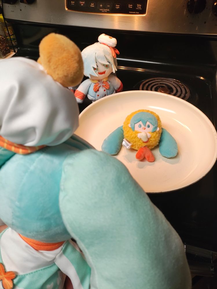 2 shrimpku plushies frying a miku tempura