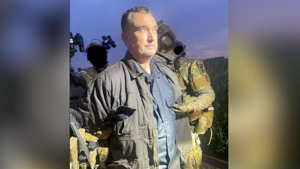 Arrest photo of Boelter. He is standing. No visible dirt or blood or him. 