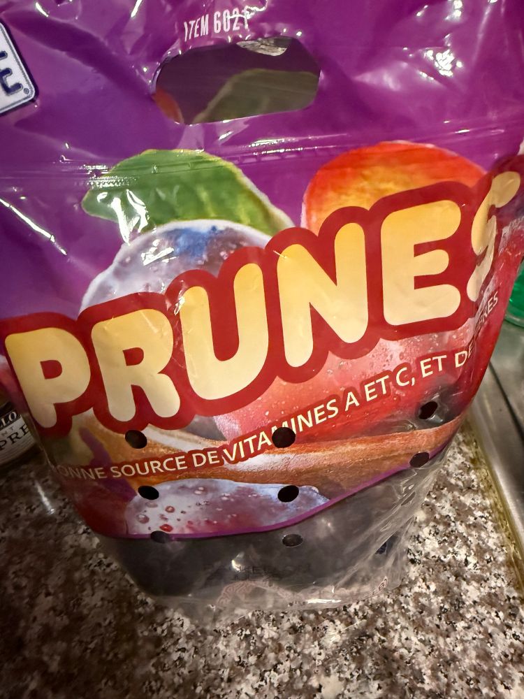 A bag of plums that says prunes because I’m looking at the French language side of the bag