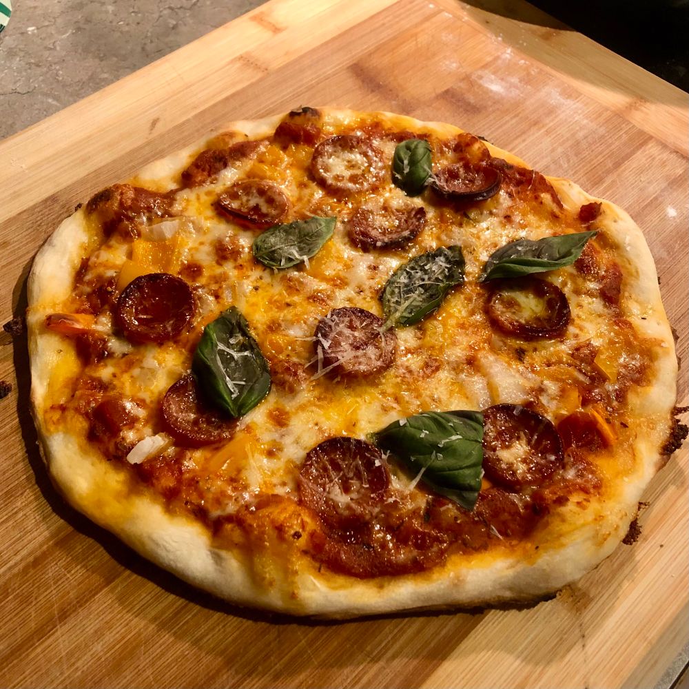 Homemade pizza moments before its demise