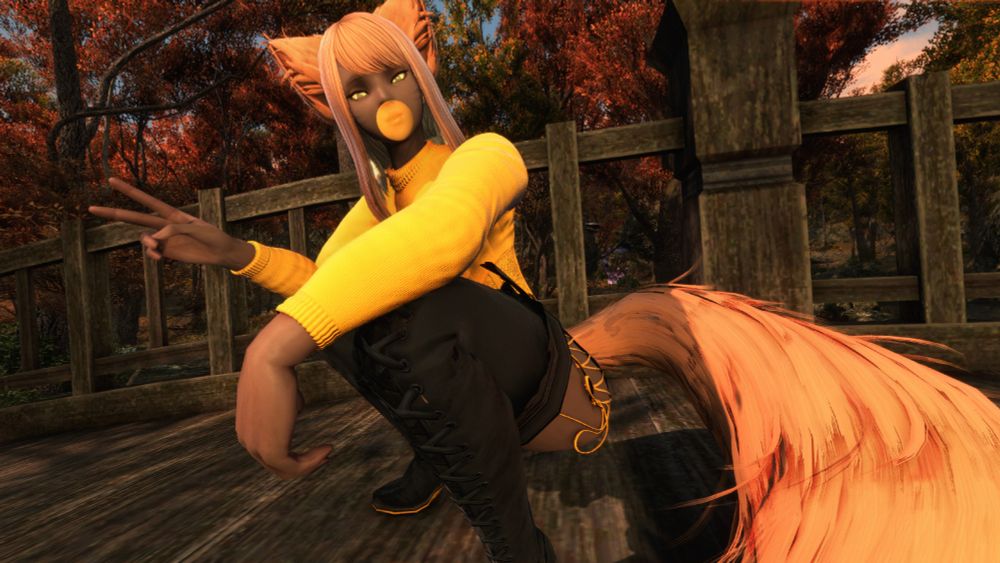 FFXIV Miqote character, Yuno, squatting on a bridge in an autumn environment, giving a peace sign as she blows a bubble gum bubble.
