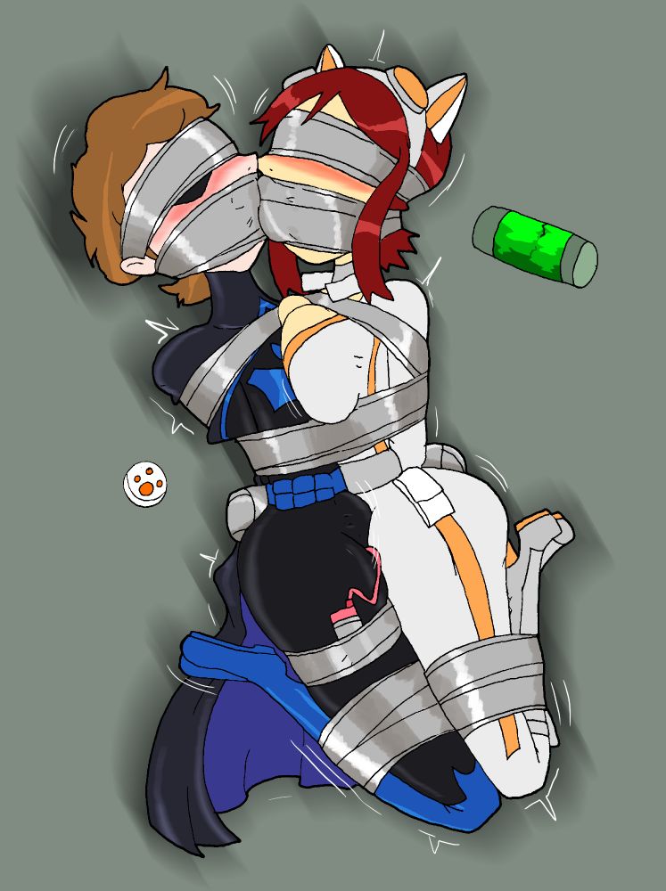 Batboy and Calico, both tightly taped together, sharing a vibe thats taped to batboy, heavily gagged and blindfoded.
