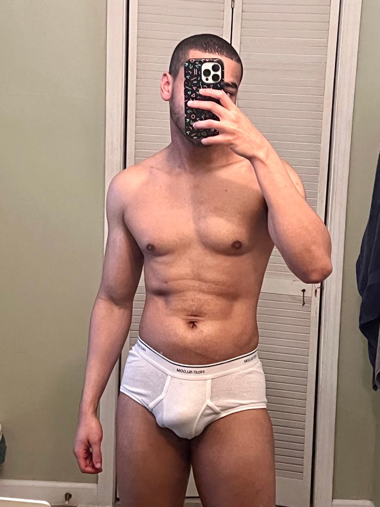 Me taking a mirror selfie in white fruit of the loom briefs. This was taken two days ago and I have lost some weight and gained muscle definition in my fitness journey.