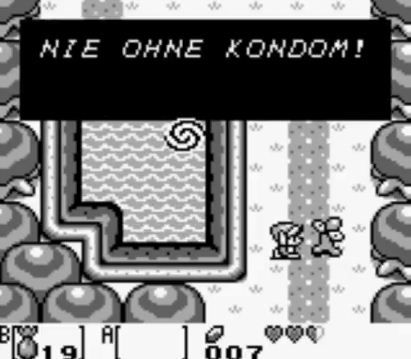 Screenshot from the German Link's Awakening of a Cukeman saying "NIE OHNE KONDOM!", "never without a condom".