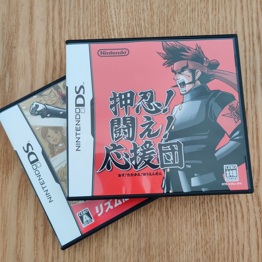 A photo of two games for the Nintendo DS, Ouedan, which would become Elite Beat Agents 