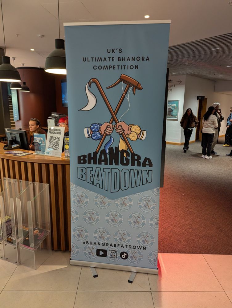 A photo of a banner for Bhangra Beatdown, a competition for dance groups from around the world to dance to traditional styles originating from the Punjab region of India 