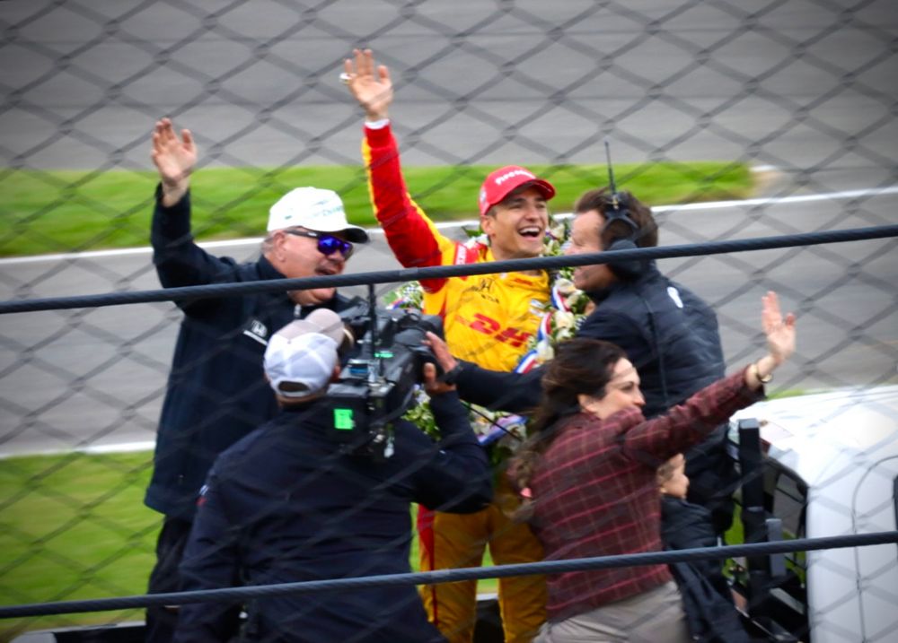 Alex Palou, his family, and Chip Ganassi celebrate winning the 2025 Indy 500