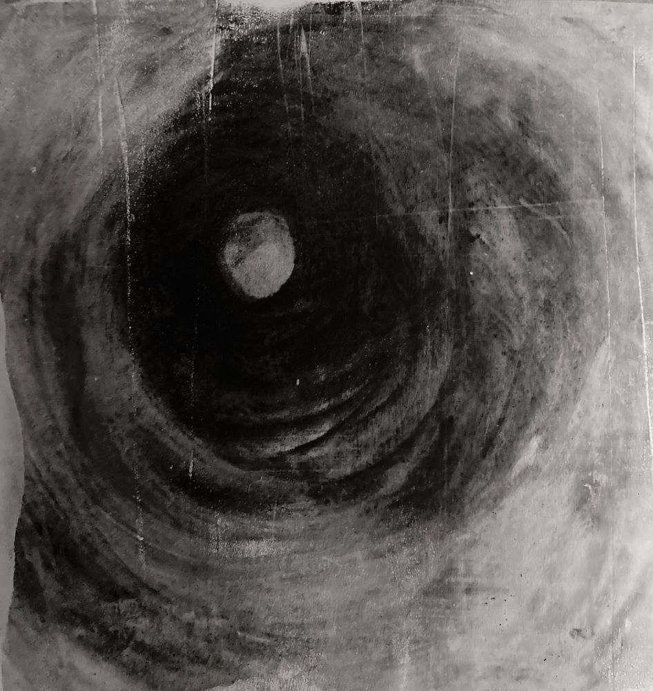 Black and white circular shapes.