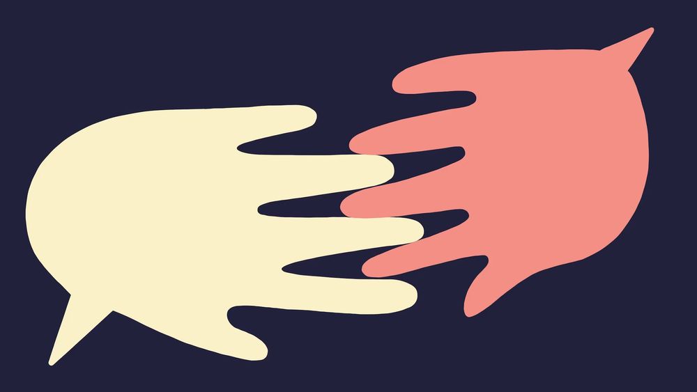 Zwei Hände, die sich an den Fingern berühren.