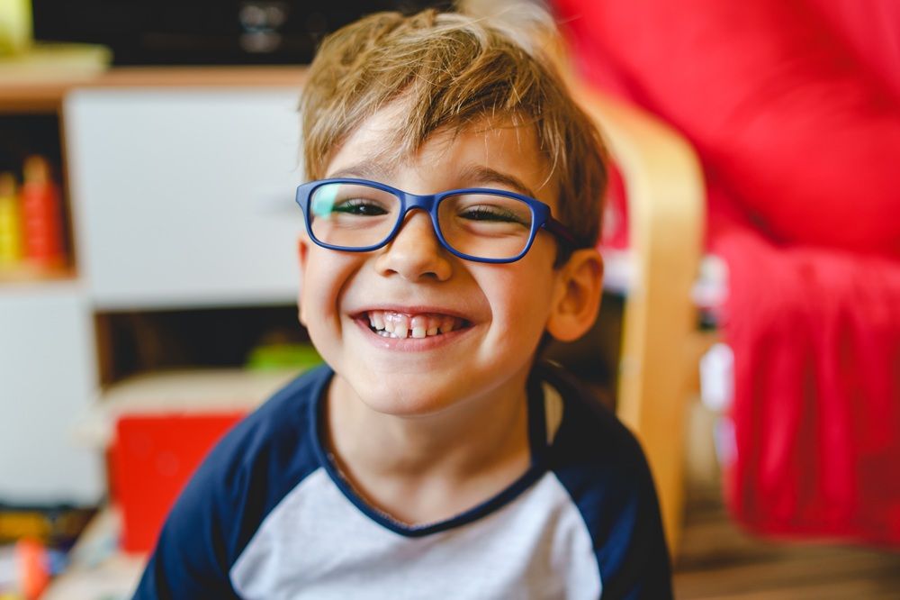 A child with glasses.
