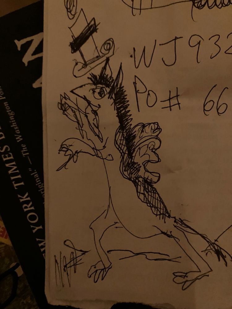 Sloppy ballpoint pen doodle of a fanciful beast on part of a notepad, drawn while talking on the phone.