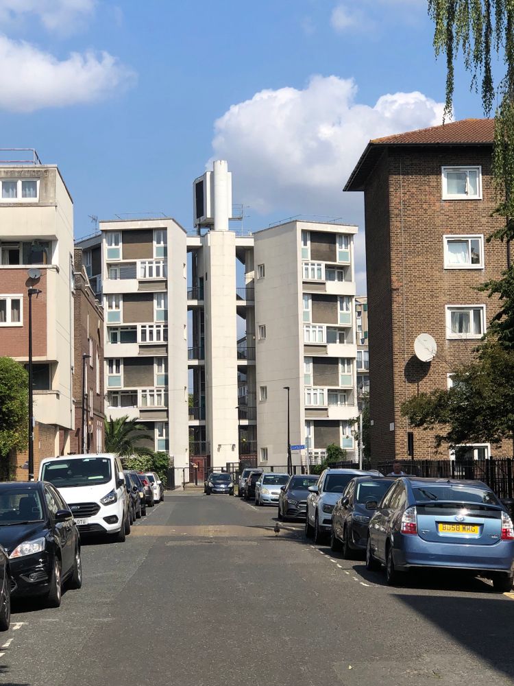 View of a late 1950s block of flats by Berthold Lubetkin. Two canted stacks of maisonettes clustered around a lift core, with open balconies connecting them