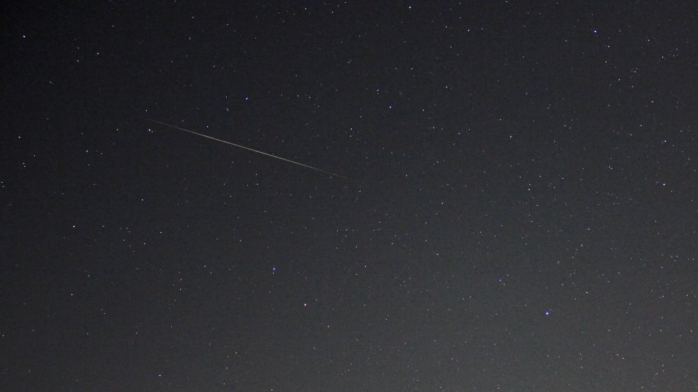 A Perseid meteor in the stars of the constellation of Draco. Captured on 13 August 2025 at 22.45 UT. Settings: Canon 550D with 18-55mm lens at 13s exp, 18mm fl, f/3.5, ISO-800.