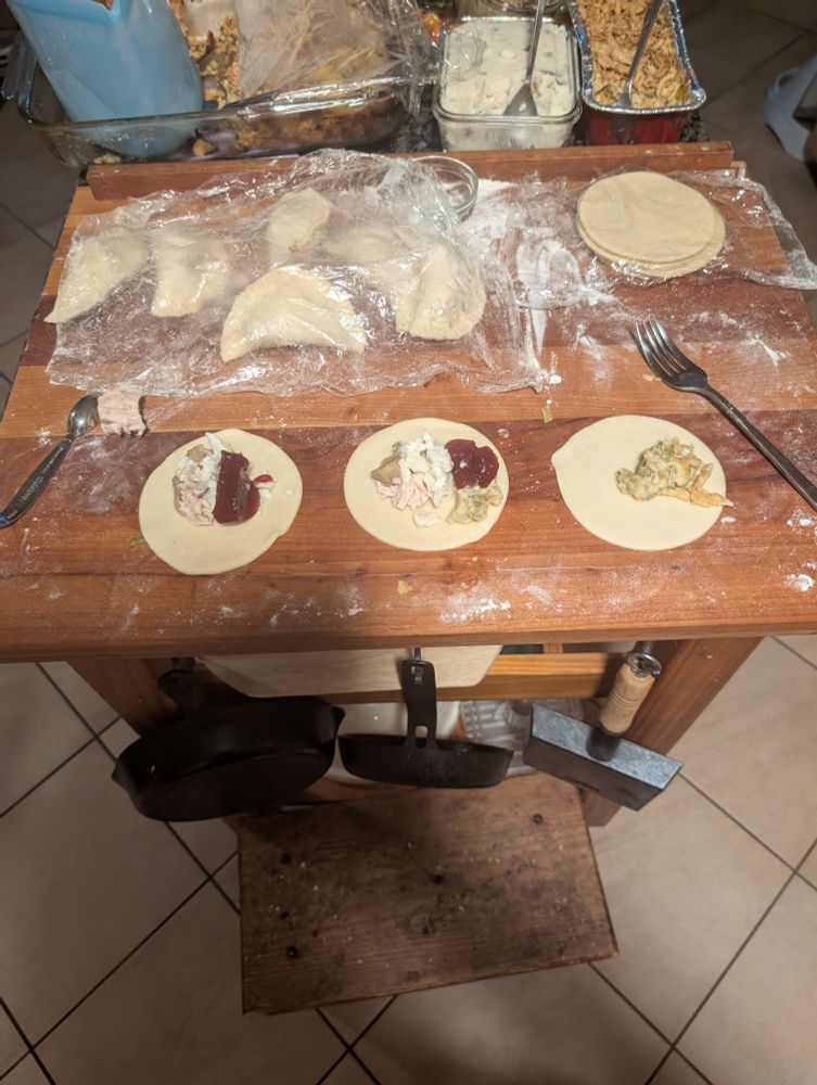 Three open dough rounds with ingredients from main Post on top