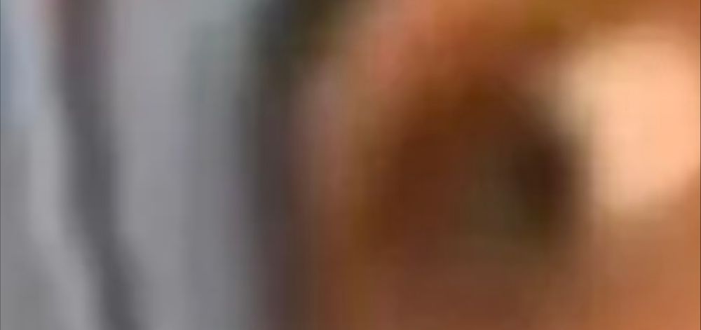 An extreme stupid closeup of the guy going "said"