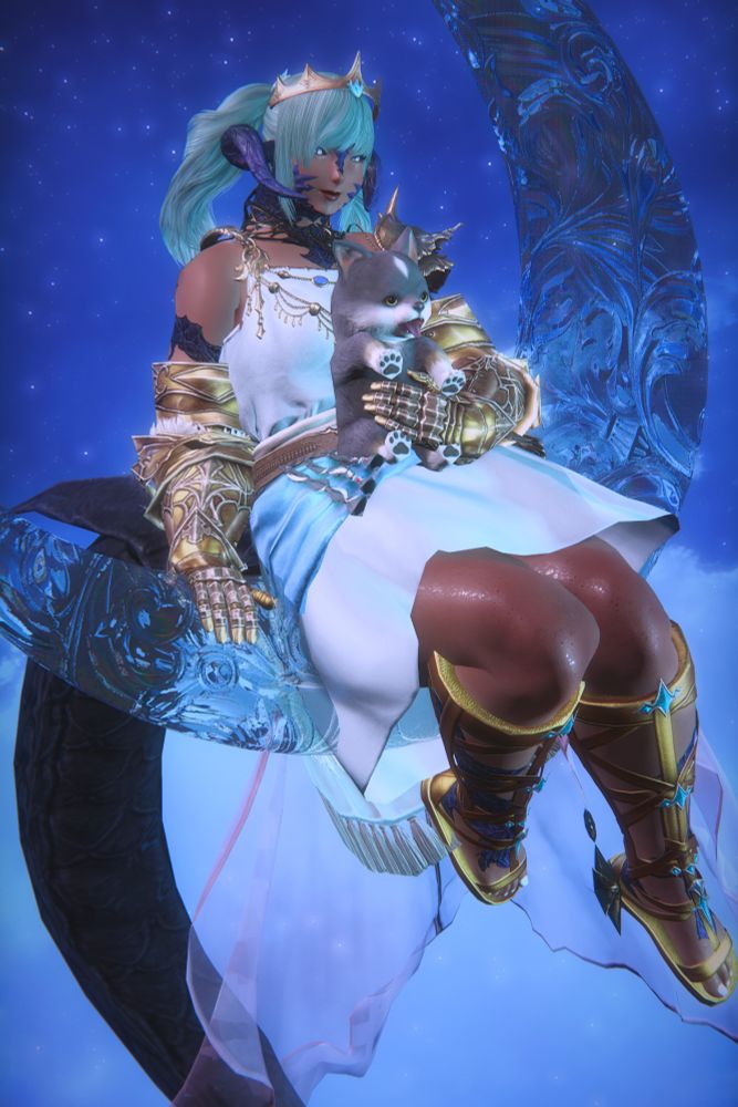 Jae'si, a teal-haired Xaela, dressed as Menphina, the Lover. She sits atop a floating moon of ornamented glass with sheer lavender cloth draping down from the bottom. Her white and blue off-shoulder dress is ornamented with blue crystals and gilded in gold, as is her crown, gauntlets, and sandals. On her lap, held firmly for safety, is a small grey & white wolf cub, meant to represent Dalamud.